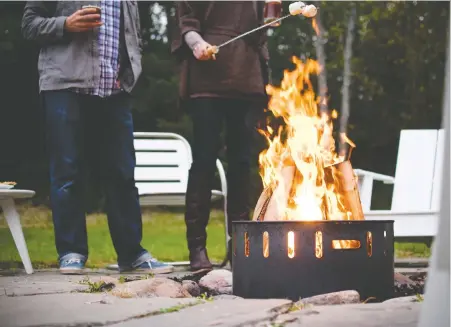  ?? LOLL DESIGNS ?? The Fire Ring by Loll Designs is an outdoor fire pit that has a plastic top so the ring can double as a table when not in use.