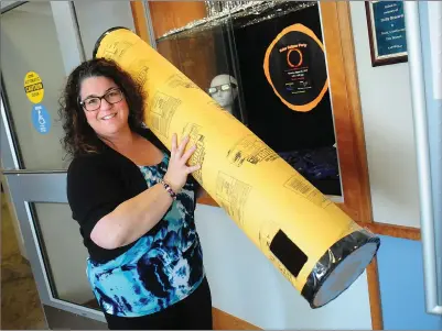  ?? Photo by Ernest A. Brown ?? Lori DeCesare, assistant director, Jesse M. Smith Memorial Library in Harrisvill­e, has created a large-scale solar eclipse viewing device to be used at a Solar Eclipse Viewing Party on Monday, August 21, 2017 from 1:15-4:15 p.m. The partial solar...
