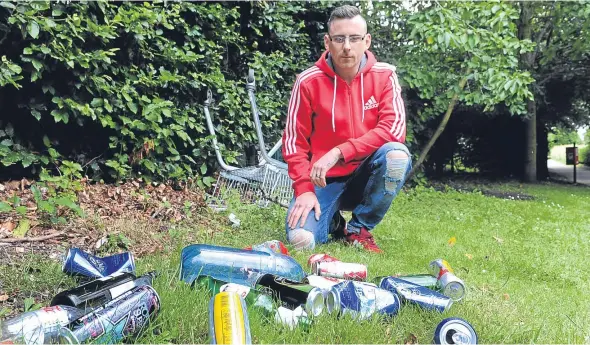  ??  ?? Matthew Sansbury has raised concerns about the rubbish on a pathway leading up to the Carseview Centre in Menzieshil­l.