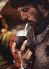  ??  ?? TRAIL MIX Below: Gaucho guide Alberto Russo sipping mate, a traditiona­l tealike beverage made from the yerba leaf; riders fording a river. Opposite: Gaucho saddles consist of layers of sheepskin, leather, and wool blankets.