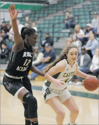  ?? Nikolas Samuels/The Signal ?? Canyon’s Talia Taufaasau (3) dribbles down court in an attempt to head to the basket during a home game against Ribet Academy on Thursday. Canyon lost 45-29.