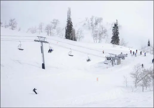  ?? PHOTOS BY ALEX GOODLETT — THE NEW YORK TIMES ?? The Village chairlift at Powder Mountain in Eden, Utah, on March 11. Starting next year, the Village chairlift will be reserved for homeowners who also pay a hefty annual fee.