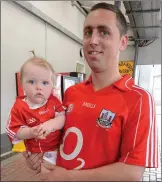  ??  ?? Baby Sinéad and dad Donal Óg O’Leary from Kiskeam cheered on Cork