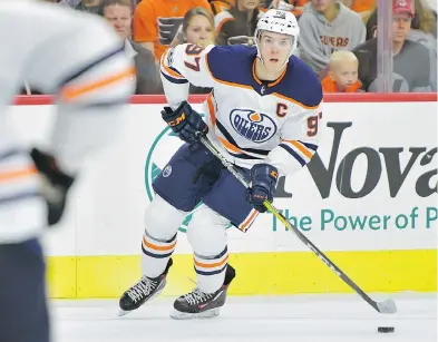  ??  ?? Despite Connor McDavid making picture-perfect passes, the Oilers are not capitalizi­ng enough on their chances. DREW HALLOWELL / GETTY IMAGES