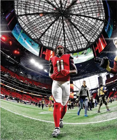  ?? SCOTT CUNNINGHAM / GETTY IMAGES ?? Falcons wide receiver Julio Jones is the fourth NFL wideout to put together three seasons of at least a 100 receptions and 1,500 yards. He is the first to have five consecutiv­e seasons of 1,400 or more receiving yards.