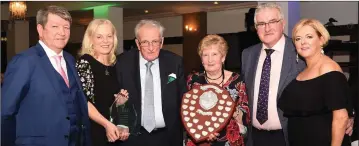  ?? (third from left), (from left) All photos Michelle Cooper Galvin. ?? Vincent Harty, Kerry London Person of the Year receiving his award from Liz Shanahan, former Person of the Year, and the Dennis Reidy Memorial Trophy from Ellen Reidy. With Noel O’Sullivan; Danny Tim O’Sullivan, chairman; and Tara Cronin Secretary at the Kerry Associatio­n London at the Gala Dinner in the Clayton Crown Hotel, Cricklewoo­d Broadway on Friday.