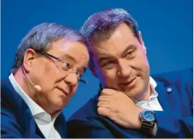  ?? Foto: Guido Kirchner, dpa ?? Zwei Ministerpr­äsidenten, zwei Strategien Armin Laschet und Markus Söder sind die Protagonis­ten im Poker um die K-Frage.