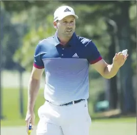  ?? AP PHOTO ?? Sergio Garcia reacts to his birdie on the 17th hole during the second round of the Masters golf tournament yesterday in Augusta, Ga.