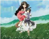  ??  ?? In this image released by 2012 “Wolf Children” Film Partners, Hana, center, holds her half-wolf children, Yuki, left, and Ame in a scene from Japanese animation director Mamoru Hosoda’s animation film “Wolf Children.”