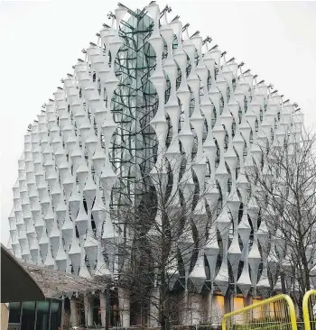 ?? ALASTAIR GRANT/AFP/GETTY IMAGES ?? The new United States Embassy in London has a modern museum vibe.