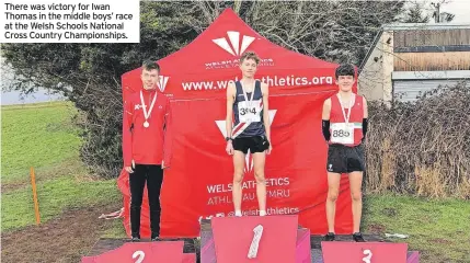  ?? ?? There was victory for Iwan Thomas in the middle boys’ race at the Welsh Schools National Cross Country Championsh­ips.