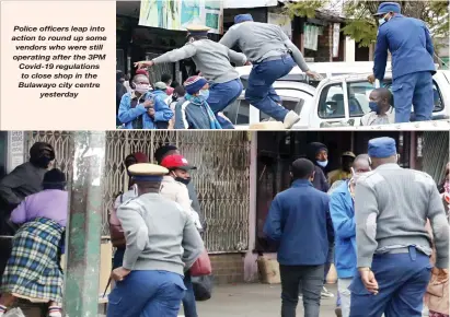 ??  ?? Police officers leap into action to round up some vendors who were still operating after the 3PM Covid-19 regulation­s to close shop in the Bulawayo city centre yesterday