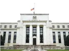  ?? AP PHOTO/PATRICK SEMANSKY ?? The Federal Reserve building in shown in Washington in May.