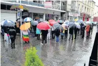  ??  ?? Some of those who attended Sunday’s vigil in Bridgend