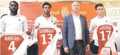  ??  ?? (From left) AS Monaco’s midfielder Jean-Eudes Aholou, forward Willem Geubbels, Russian vice-president Vadim Vasilyev and Russian midfielder Aleksandr Golovin pose during a presentati­on of the club’s new players at the Hotel Hermitage in Monaco. — AFP photo