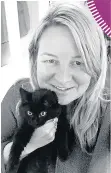  ??  ?? Katy Kew of Silver Pet Prints South Leicesters­hire and Market Bosworth with her cat Floof