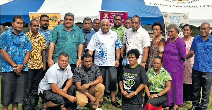  ?? Photo: Peni Komaisavai ?? Prime Minister Voreqe Bainimaram­a with members of the Education Ministry in the Western Division in Nawairuku, Nalawa, Ra, on July 18, 2018.