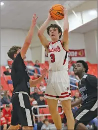  ?? JUSTIN MANNING/SPECIAL to The Saline Courier ?? Harmony Grove senior Cash Parker, 3, competes in a game earlier this week. The Cardinals picked up their first win Thursday, defeating Ouachita 56-39 Thursday in Haskell.