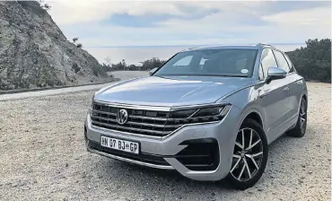  ??  ?? The new Touareg features big design improvemen­ts that give it far more presence than previous generation­s. The interior, left, is excellent with great comfort and equipment. The extended rear provides an additional 113l of luggage space, right.