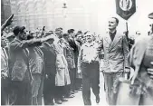  ?? ?? Supporters greet Oswald Mosley with fascist salute in London in 1937