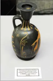  ?? AP FILE PHOTO ?? In this May 25, 2017 file photo provided by the Manhattan District Attorney’s Office in New York is A pottery vessel isd among seven ancient statues and pottery vessels heading back to their homeland in Italy after authoritie­s tracked down the stolen...