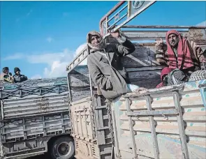  ?? CHRIS MCGRATH GETTY IMAGES ?? Civilian numbers fleeing fighting have increased in recent days after the beginning of a final operation by the US-led coalition and the Syrian Democratic Forces (SDF) to oust ISIL from Bagouz, the last village held by the extremist group.