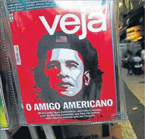  ??  ?? Las imágenes de Obama y el Che Guevara fundidas en una calle de Río de Janeiro