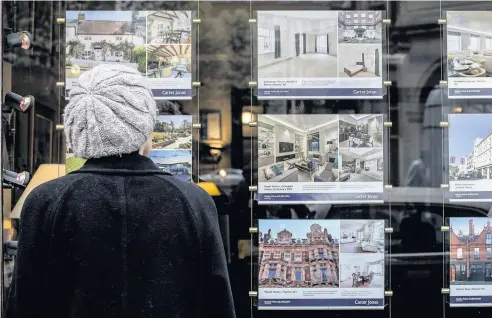  ??  ?? > House prices in Wales have been described as ‘resilient’, but homes across Britain have seen £29bn wiped off their value this year