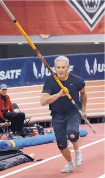  ?? JIM THOMPSON/JOURNAL ?? New Mexico Secretary of State Brad Winters heads down the runway as he tries to clear 10 feet, 6 inches in the pole vault.