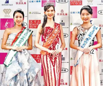  ?? ?? Carolina Shiino, centre, who was born in Ukraine to Ukrainian parents, was crowned Miss Japan on Monday