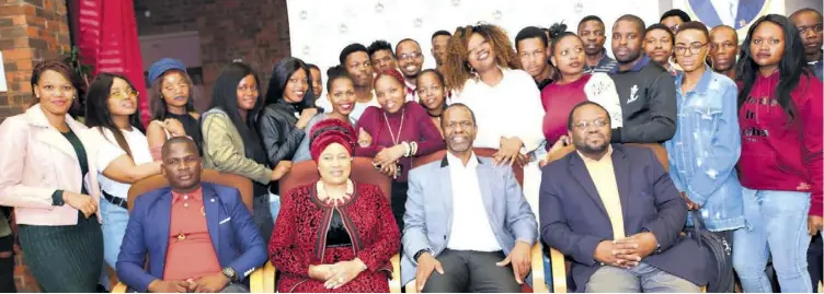  ??  ?? Health MEC Dr Sibongisen­i Dhlomo and other stakeholde­rs with a few of the KZN medical students who headed back to Cuba to continue their studies