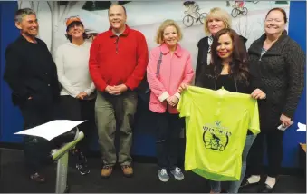  ?? Photo by Erica Moser ?? Pictured from left to right are Miles for Meals organizers Peter Vasconcell­os, Diane Erskine Kisseberth, Luke Brissette, Beth Sheridan, Diane D'Ambra, Heather Borges and Kellee Paz. The group is signing up riders for a group bicycle run that will help...