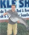  ?? Delaware Department of Natural Resources and Environmen­tal Control ?? Jordan Chelton shows off his Delaware-record 36-pound, 3.2ounce blue catfish.