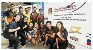  ??  ?? Let’s go: The national squash players taking a group photo after the press conference on the Malaysian Open yesterday. — AZHAR MAHFOF / The Star