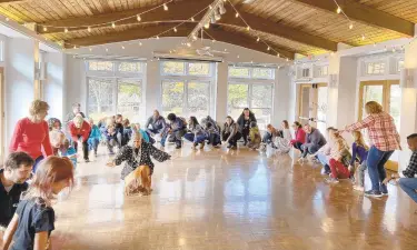  ?? OLIVIA SANCHEZ/CAPITAL GAZETTE PHOTOS ?? Natalie Proctor, tribal chair of the Cedarville Wild Turkey Clan of Piscataway Tribe, teaches community members a series of tribal dances at an educationa­l event in honor of Native American heritage.