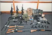  ?? U.S. ATTORNEY'S OFFICE IN MARYLAND ?? A stockpile of weapons authoritie­s say they found in Christophe­r Hasson’s apartment. He was arrested Friday.