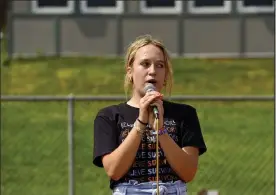  ??  ?? Fairview High School senior Annika Spilde speaks to students during a walkout to protest the administra­tion’s handling of reports of sexual assault and harassment on Friday in Boulder.