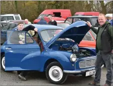  ??  ?? Ballylongf­ord vintage enthusiast­s Calvin and Ger Healy with their 1961 model Morris at the Moyvane Village Festival on Sunday.