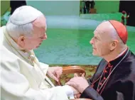  ?? MASSIMO SAMBUCETTI/AP ?? A Vatican report says Pope John Paul II believed former Cardinal Theodore Mccarrick’s denial of sexual-abuse allegation­s.