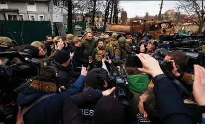  ?? UKRAINIAN PRESIDENTI­AL PRESS SERVICE / HANDOUT / REUTERS ?? Ukrainian President Volodymyr Zelensky speaks to the media in Bucha, outside Kyiv, Ukraine, on April 4.