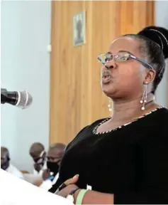  ?? Picture: ABONGILE SOLUNDWANA ?? HANDS JOINED: ANC provincial executive member, Nomakhosaz­ana Meth, addresses the Church of God and Saints of Christ congregati­on during the Bulhoek Massacre centennial commemorat­ion