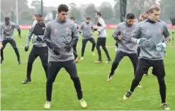  ??  ?? MOSCOW: Liverpool’s players attend a team training session at the club’s Melwood training complex in Liverpool, north west England, yesterday, on the eve of their Champions League Group E football match against Spartak Moscow in Russia. — AFP