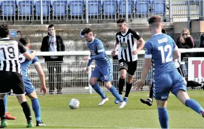  ?? Picture: eventphoto­wales ?? Bangor City’s Dean Rittenberg takes on the Cefn Druids defence