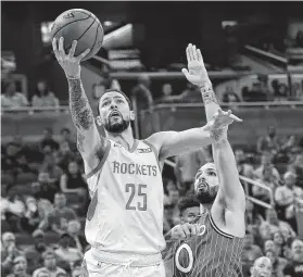  ?? John Raoux / Associated Press ?? Rockets guard Austin Rivers matched his uniform number with 25 points on 10-for-14 shooting. Rivers started and played nearly 37 minutes Sunday.