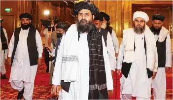 ?? — AFP photo ?? A Taliban delegation attends a session of the peace talks between the Afghan government and the Taliban in the Qatari capital Doha.