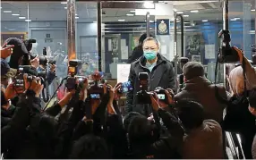 ?? EPA ?? Vanishing freedoms: Activist Benny Tai Yiu-ting talks to media after being bailed