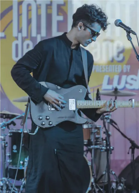  ?? Photos Keone Glover ?? +Aziz at playing at a music festival in Louisiana in 2019; below, Kuwaisiana band members, from left, Matthieu L’etudiant, Dehan Elcin, +Aziz, Patrick Driscoll, Nick Ferreirae, and Sam Levine