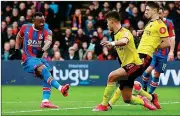  ??  ?? MAN OF THE MOMENT: Jordan Ayew strikes and there was no way back for Watford at Selhurst Park