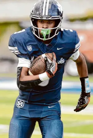  ?? Eric Taylor/SBLiveSpor­ts ?? Marin Catholic-Kentfield’s Charles Williams, the Chronicle’s 2023 Metro Player of the Year, rushed for 1,361 yards, caught 19 passes for 418 yards, had a school-record 11 picks and scored 30 touchdowns.