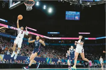  ?? ERIC GAY/AP ?? South Carolina’s Destanni Henderson shoots during the second half of the NCAA national championsh­ip game against UConn last April in Minneapoli­s. South Carolina beat UConn to win its second NCAA women’s basketball title. The two teams will play Sunday at the XL Center.